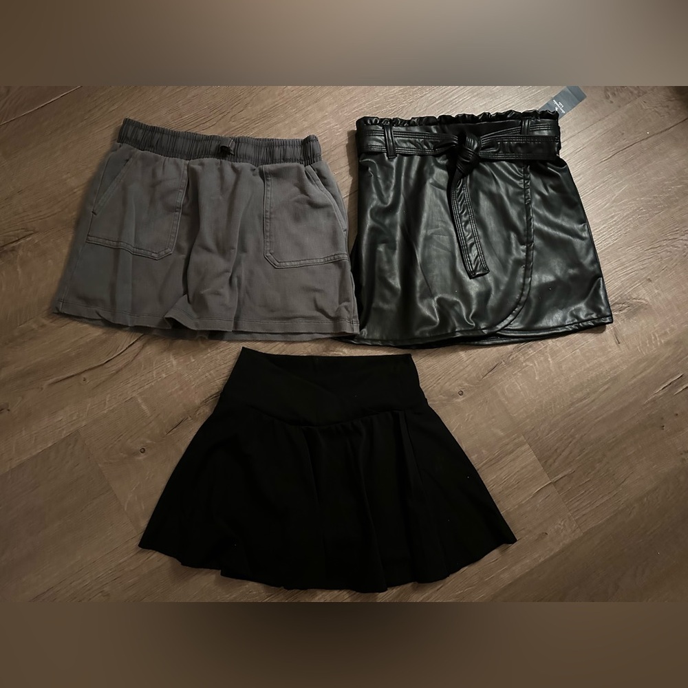 Girls skirts (with shorts underneath) size 13/14